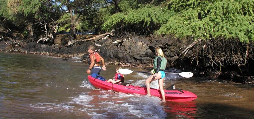 Family enjoying a kayaking adventure in Maui during the fall season — showing why fall is the best time for kayaking in Maui.